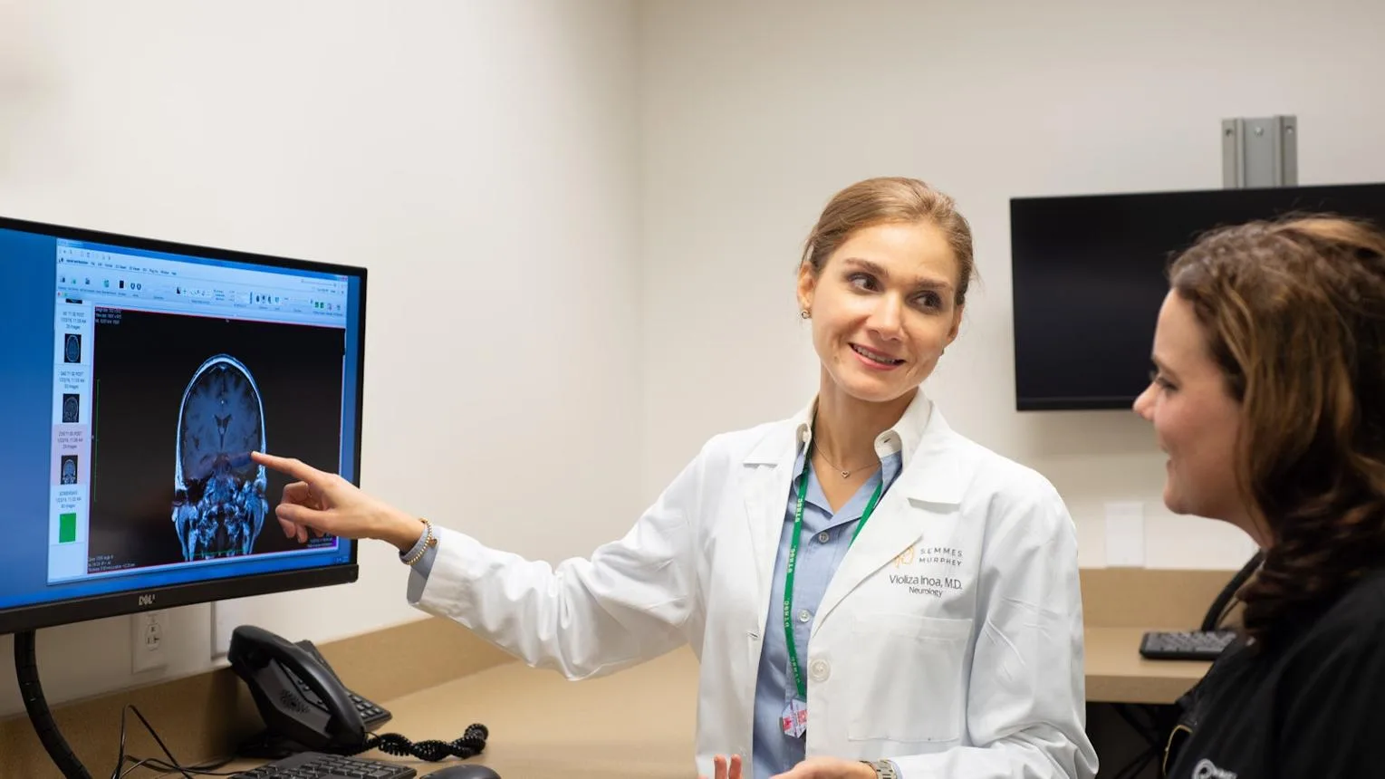 Clinician examining a patient with a stethoscope